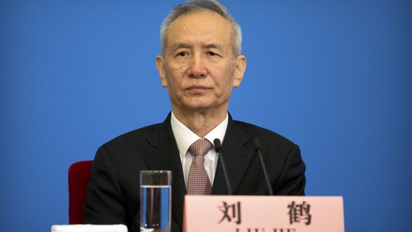 FILE - In this Tuesday, March 20, 2018, file photo, Vice Premier Liu He attends a press conference after the closing session of China&#039;s National People&#039;s Congress (NPC) at the Great Hall of  ...