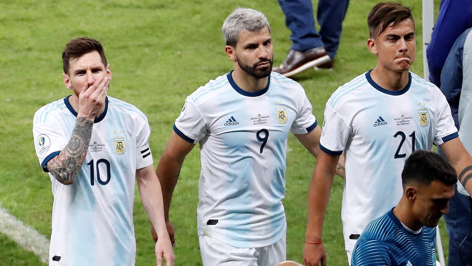 epa07690938 Argentinian players Leo Messi (L), Kun Aguero (C), and Paolo Dybala (R) react at the end of the Copa America 2019 semi-finals soccer match between Brazil and Argentina at Mineirao Stadium  ...