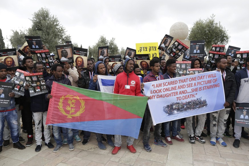 epa05751520 African asylum seekers protest in front of the Israeli Supreme Court, in Jerusalem, Israel, 26 January 2017. Hundreds of African migrants from Eritrea held a protest outside the Israeli Su ...
