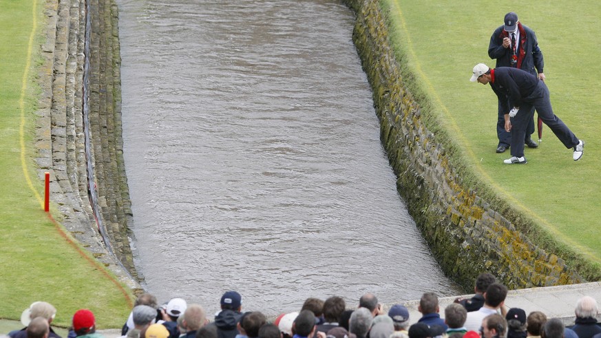 FILE - In this July 22, 2007, file photo, Ireland&#039;s Padraig Harrington looks down to where his ball landed in the Barry Burn during the final round of the British Open Golf Championship at Carnou ...