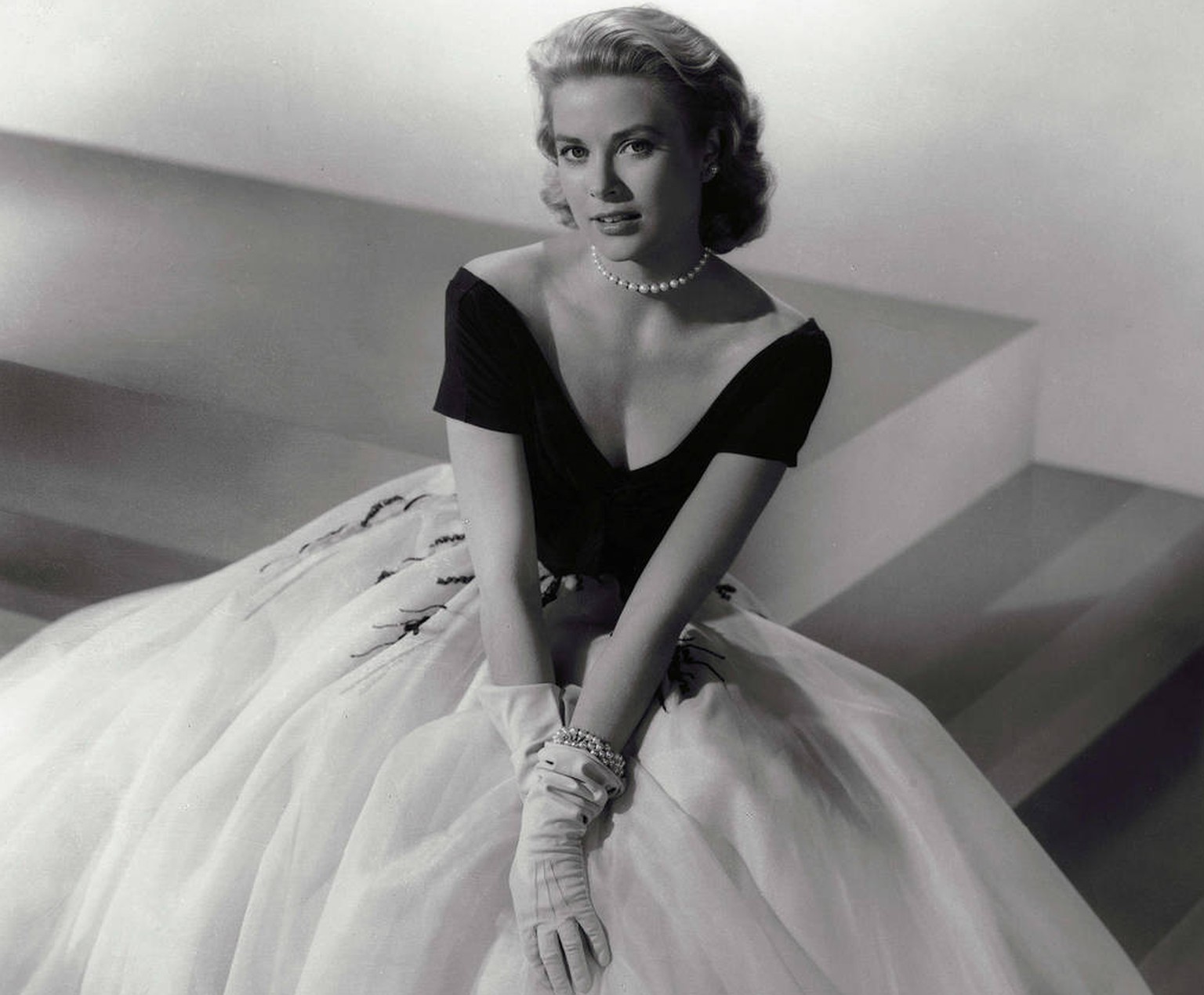 This photo released by Lisa Lori Communications shows a dress worn by Grace Kelly in the film &quot;Rear Window&quot; that inspired Carolina Herrera to design her own version. (AP Photo/Lisa Lori Comm ...