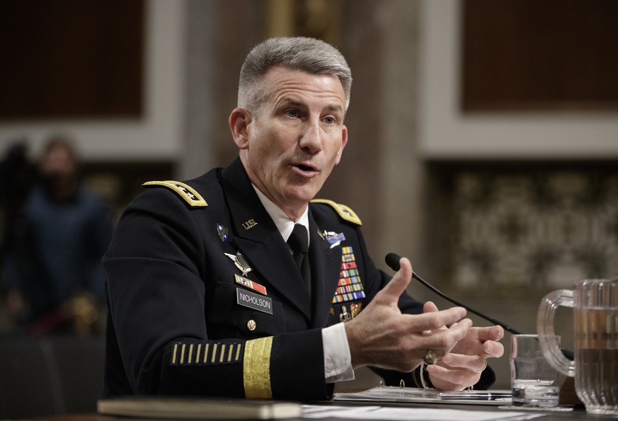 FILE - In this Feb. 9, 2017 file photo, Gen. John Nicholson, the top U.S. commander in Afghanistan, testifies on Capitol Hill in Washington. Frustrated by his options, President Donald Trump is withho ...