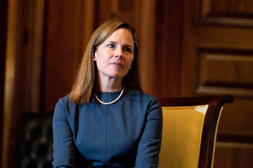 epa08706850 Judge Amy Coney Barret, President Trump&#039;s nominee for Supreme Court, meets with Senator Rick Scott, R-FL, at the United States Capitol Building in Washington, DC, USA, 29 September 20 ...