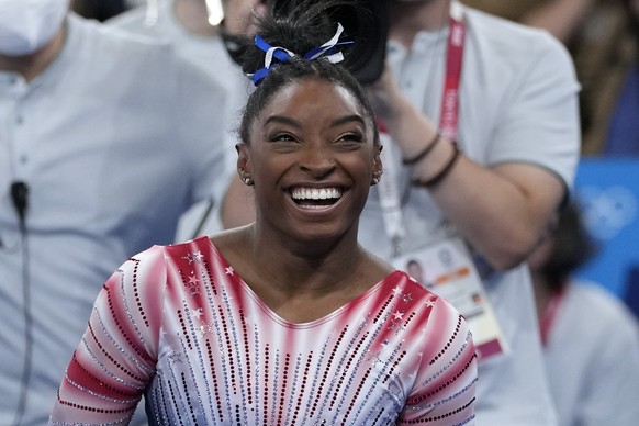 Simone Biles, of the United States, after performing on the balance beam during the artistic gymnastics women&#039;s apparatus final at the 2020 Summer Olympics, Tuesday, Aug. 3, 2021, in Tokyo, Japan ...