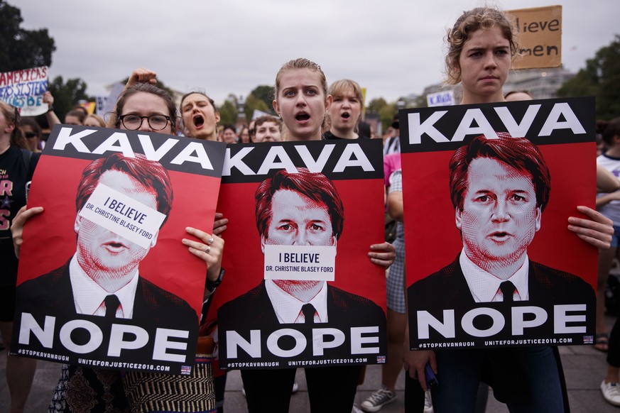 epa07074599 Activists protest against Supreme Court nominee Judge Brett Kavanaugh on the East Front of the US Capitol in Washington, DC, USA, 06 October 2018. The Senate is voting on the confirmation  ...
