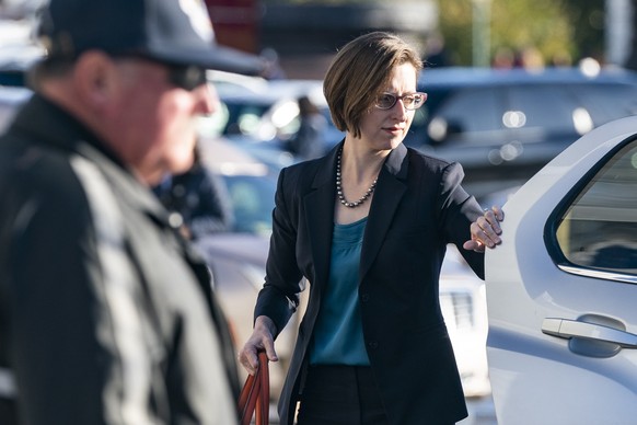 epa07943107 Laura Cooper (C), a deputy assistant secretary for the Defense Department, arrives for her deposition amid the US House of Representatives&#039; impeachment inquiry into President Trump ou ...