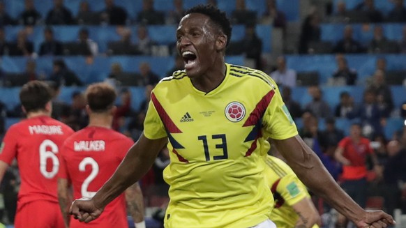 Colombia&#039;s Yerry Mina celebrates after scoring his first side&#039;s goal during the round of 16 match between Colombia and England at the 2018 soccer World Cup in the Spartak Stadium, in Moscow, ...