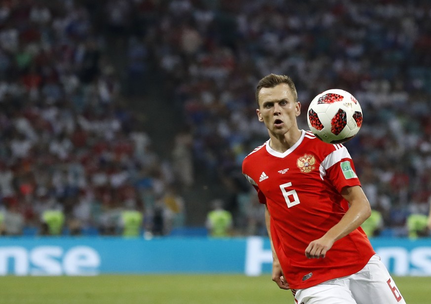 FILE - In this Saturday, July 7, 2018 file photo, Russia&#039;s Denis Cheryshev controls the ball during their quarterfinal match against Croatia at the 2018 soccer World Cup in the Fisht Stadium, in  ...