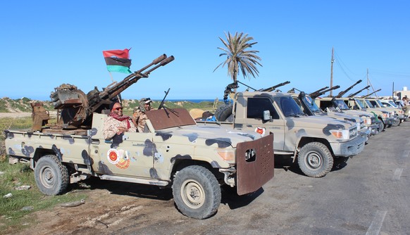epaselect epa07489297 Vehicles and militants, reportedly from the Misrata militia, gather to join Tripoli forces, in Tripoli, Libya, 06 April 2019. According to reports, commander of the Libyan Nation ...