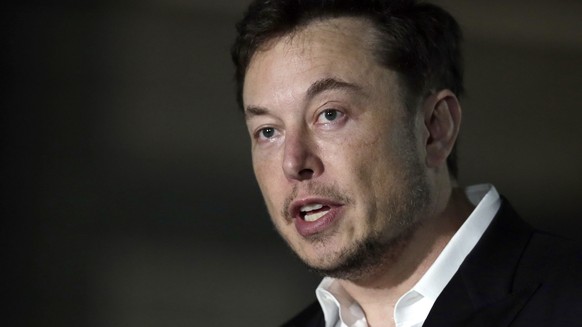 FILE - In this June 14, 2018, file photo, Tesla CEO and founder of the Boring Company Elon Musk speaks at a news conference in Chicago. Musk announced Tuesday, Aug. 7, that he is considering taking th ...