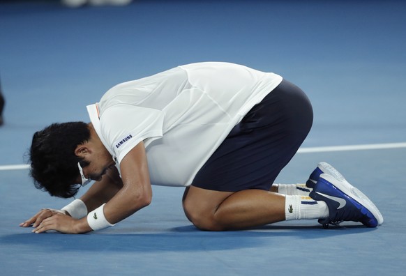 South Korea&#039;s Chung Hyeon kneels on the court as he celebrates after defeating Serbia&#039;s Novak Djokovic at the Australian Open tennis championships in Melbourne, Australia, Monday, Jan. 22, 2 ...