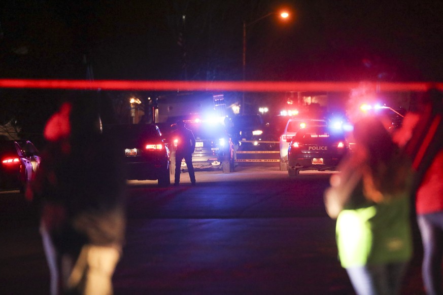 Police investigate after four people were killed and a fifth person was injured in a shooting at a Grantsville, Utah, home Friday, Jan. 17, 2020. The suspected shooter was taken into custody by Grants ...