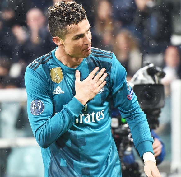 epa06644074 Real Madrid&#039;s Cristiano Ronaldo jubilates after scoring the 2-0 goal during the UEFA Champions League quarter final first leg soccer match between Juventus FC vs Real Madrid CF at All ...