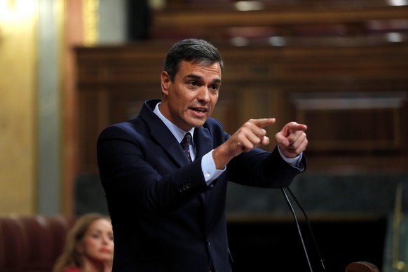 epa07834522 Spanish acting Prime Minister, Pedro Sanchez, delivers a speech at the Lower House in Madrid, Spain, 11 September 2019, during question time. Sanchez is appearing at Parliament to inform a ...