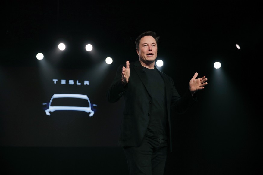 FILE- In this March 14, 2019, file photo Tesla CEO Elon Musk speaks before unveiling the Model Y at Tesla&#039;s design studio in Hawthorne, Calif. Musk was the top paid CEO in California for 2018, as ...