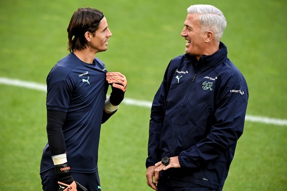 epa08738526 Swiss national soccer team head coach Vladimir Petkovic (R) and goalkeeper Yann Sommer (L) attend their team&#039;s training session in Cologne, Germany, 12 October 2020. Switzerland will  ...