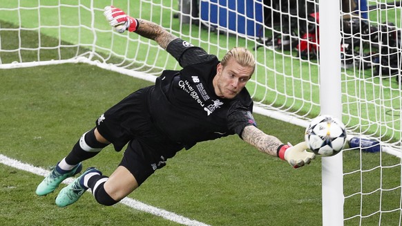 epa06765756 Liverpool&#039;s goalkeeper Loris Karius in action during the UEFA Champions League final between Real Madrid and Liverpool FC at the NSC Olimpiyskiy stadium in Kiev, Ukraine, 26 May 2018. ...