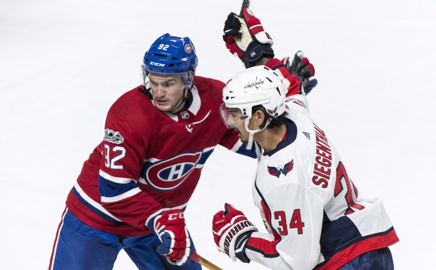 Washington Capitals&#039; Jonas Siegenthaler is stopped by Montreal Canadiens&#039; Jonathan Drouin during the first period of a preseason NHL hockey game, Wednesday, Sept. 20, 2017 in Montreal. (Paul ...