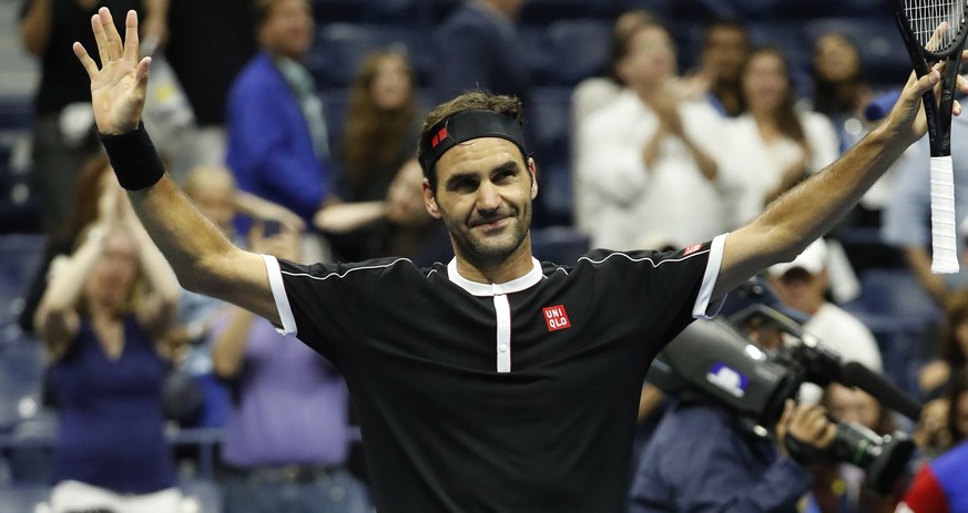 epa07796486 Roger Federer of Switzerland reacts after defeating Sumit Nagal of India during their match on the first day of the US Open Tennis Championships the USTA National Tennis Center in Flushing ...