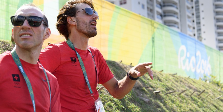 Fabian Cancellara, right, and Michael Albasini, left, cyclists of Switzerland, during the welcome ceremony of the Team Switzerland in the Olympic Media Village in Rio de Janeiro, Brazil, prior to the  ...