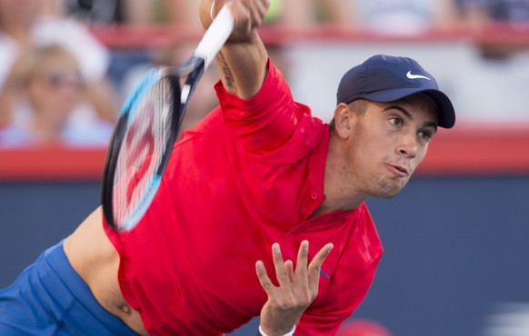 Borna Coric of Croatia serves to Rafael Nadal of Spain during the Rogers Cup men’s tennis tournament, Wednesday, Aug. 9, 2017 in Montreal. (Paul Chiasson/The Canadian Press via AP)