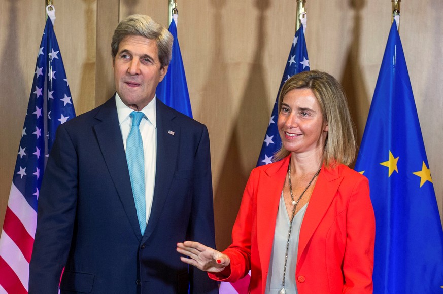 U.S. Secretary of State John Kerry poses with EU foreign policy chief Federica Mogherini (R) during an European Union foreign ministers meeting in Brussels, Belgium, July 18, 2016. REUTERS/Stephanie L ...