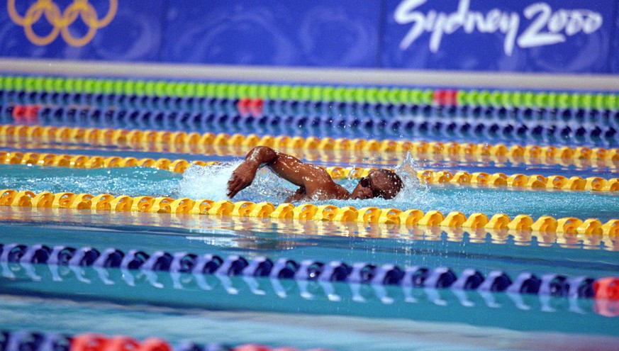 19 Sep 2000: Eric Moussambani of Equatorial Guinea swims alone in his Men&#039;s 100m Freestyle Heat after his two opponents are both disqualified at the Sydney International Aquatic Centre on Day Fou ...