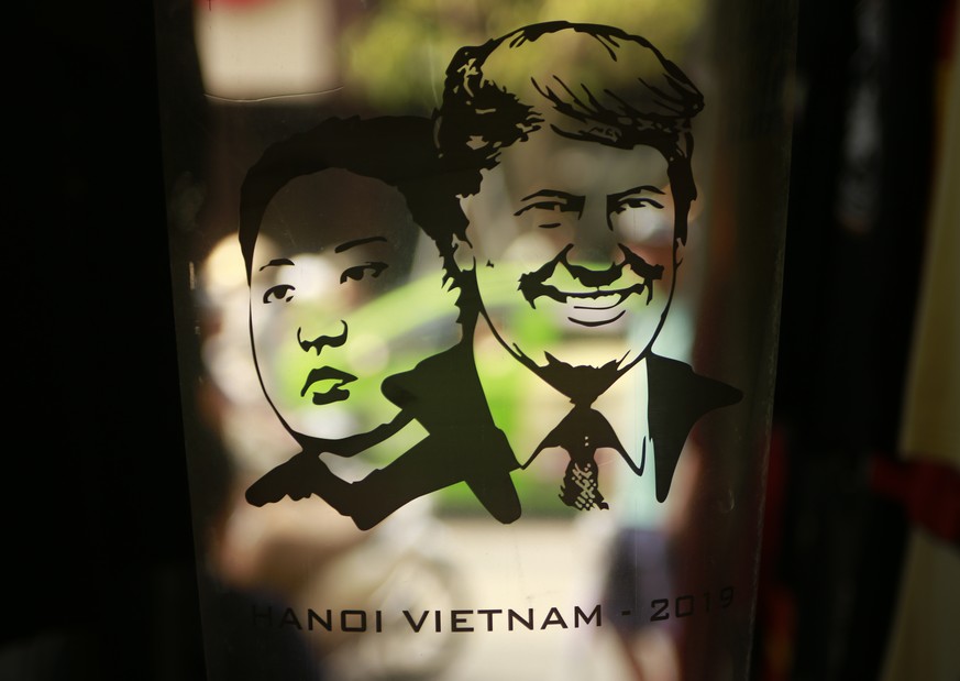 A print design with portraits of U.S. President Donald Trump, right, and North Korean leader Kim Jong Un, at a custom t-shirt shop in Hanoi, Vietnam, on Thursday, Feb. 21, 2019. Hanoi is gearing up to ...