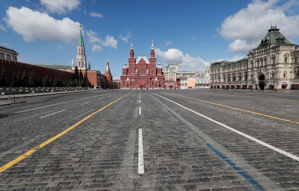 epa08376990 General view of a deserted Red Square in Moscow, Russia, 20 April 2020. Russian President Vladimir Putin extended the current nationwide lockdown with stay-at-home orders until the end of  ...