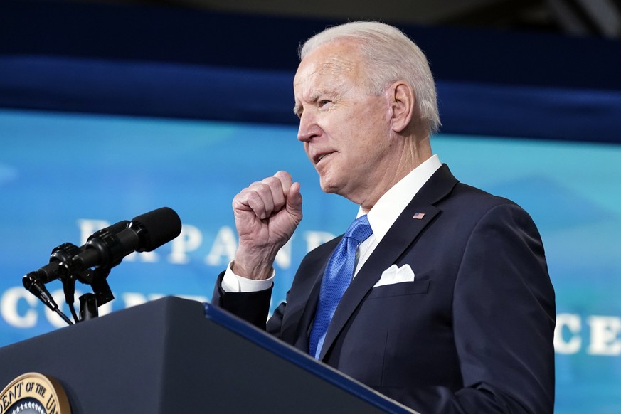 President Joe Biden, accompanied by Johnson and Johnson Chairman and CEO Alex Gorsky, and Merck Chairman and CEO Kenneth Frazier, speaks at an event in the South Court Auditorium in the Eisenhower Exe ...