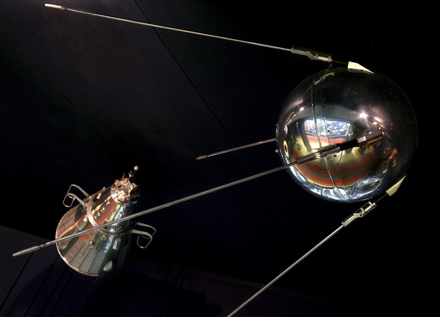 epa07672241 (FILE) - A back-up copy of the first Russian Sputnik (satellite) (R), and a small replica (L) of the second Russian satellite are displayed in a small museum in the cosmonaut training cent ...