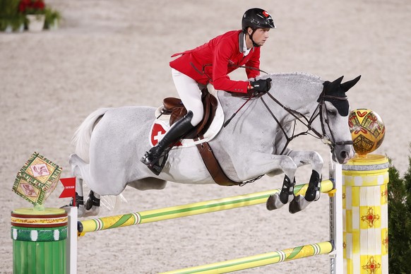 Martin Fuchs of Switzerland riding Clooney 51 competes in the equestrian jumping individual qualifier at the 2020 Tokyo Summer Olympics in Tokyo, Japan, on Tuesday, August 03, 2021. (KEYSTONE/Peter Kl ...
