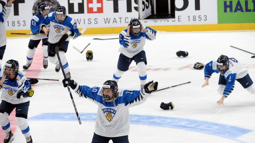 Finnish players celebrate a game-winning overtime goal which was later disallowed during the IIHF Women&#039;s Ice Hockey World Championships final match between the United States and Finland in Espoo ...