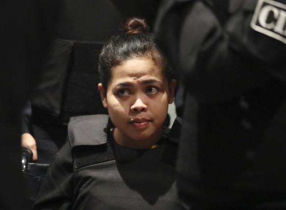 FILE - In this Oct. 24, 2017, file photo, Indonesian Siti Aisyah waits at Kuala Lumpur International Airport in Sepang, Malaysia. The Indonesian woman held two years on suspicion of killing the North  ...