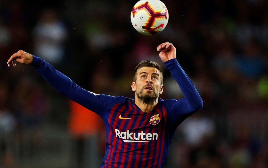 epa06957346 Barcelona&#039;s Gerard Pique in action during the Spanish Primera Division soccer match between Barcelona FC and Deportivo Alaves, at the Camp Nou Stadium, in Barcelona, Spain, 18 August  ...