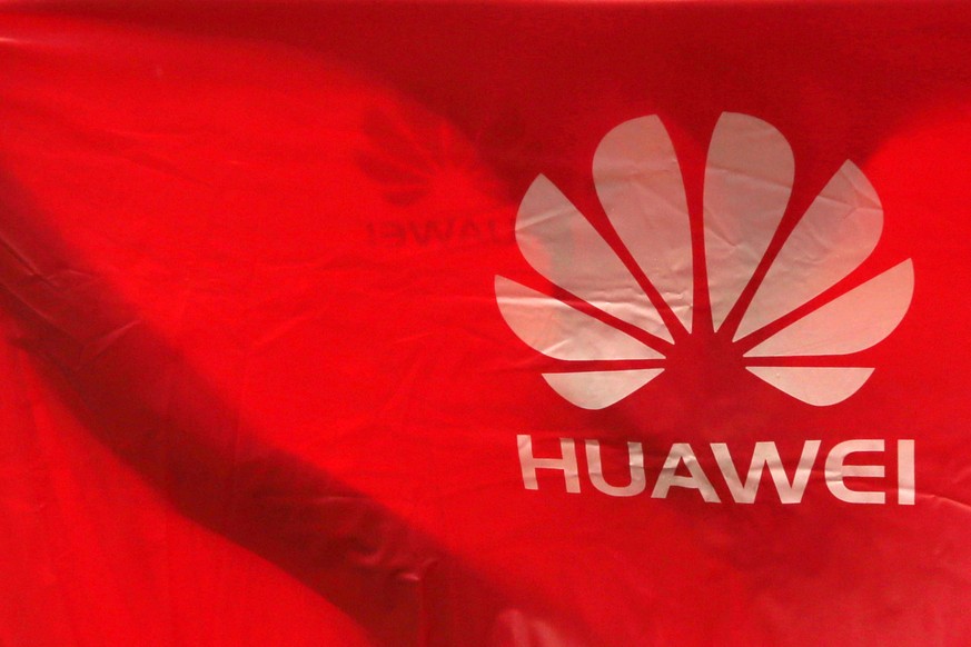 epa07630610 Huawei logos are displayed in a raincoat in Phnom Penh, Cambodia, 06 June 2019. According to local media, Huawei smartphone sales have dropped in the capital&#039;s retail shop for more th ...