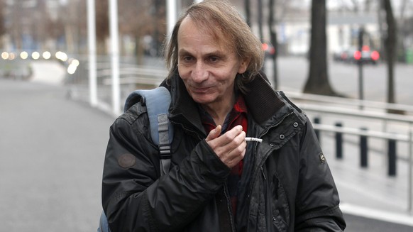 FOR STORY SLUGGED EU BOOKS HOULLEBECQ SUBMISSION BY GREG KELLER - This Wednesday, Jan. 7, 2015 photo shows French novelist Michel Houellebecq after an interview on radio station France Inter, in Paris ...