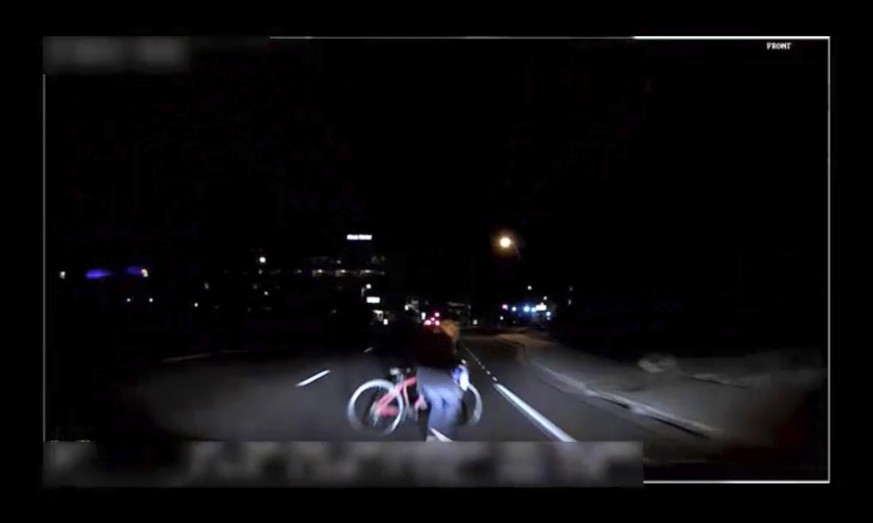 This image made from video Sunday, March 18, 2018, of a mounted camera provided by the Tempe Police Department shows an exterior view moments before an Uber SUV hit a woman in Tempe, Ariz. Video of a  ...