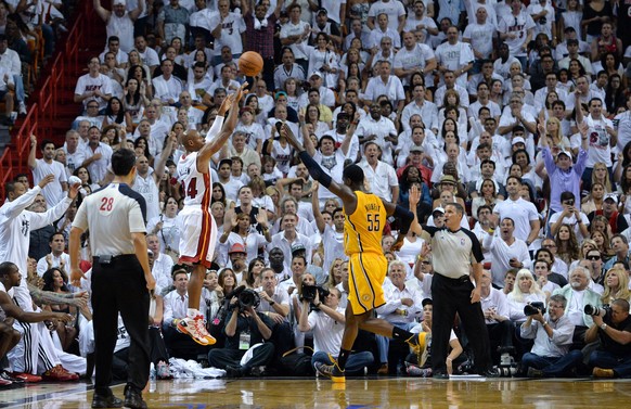 May 24, 2014; Miami, FL, USA; Miami Heat guard Ray Allen (34) takes a three point shot over Indiana Pacers center Roy Hibbert (55) in game three of the Eastern Conference Finals of the 2014 NBA Playof ...