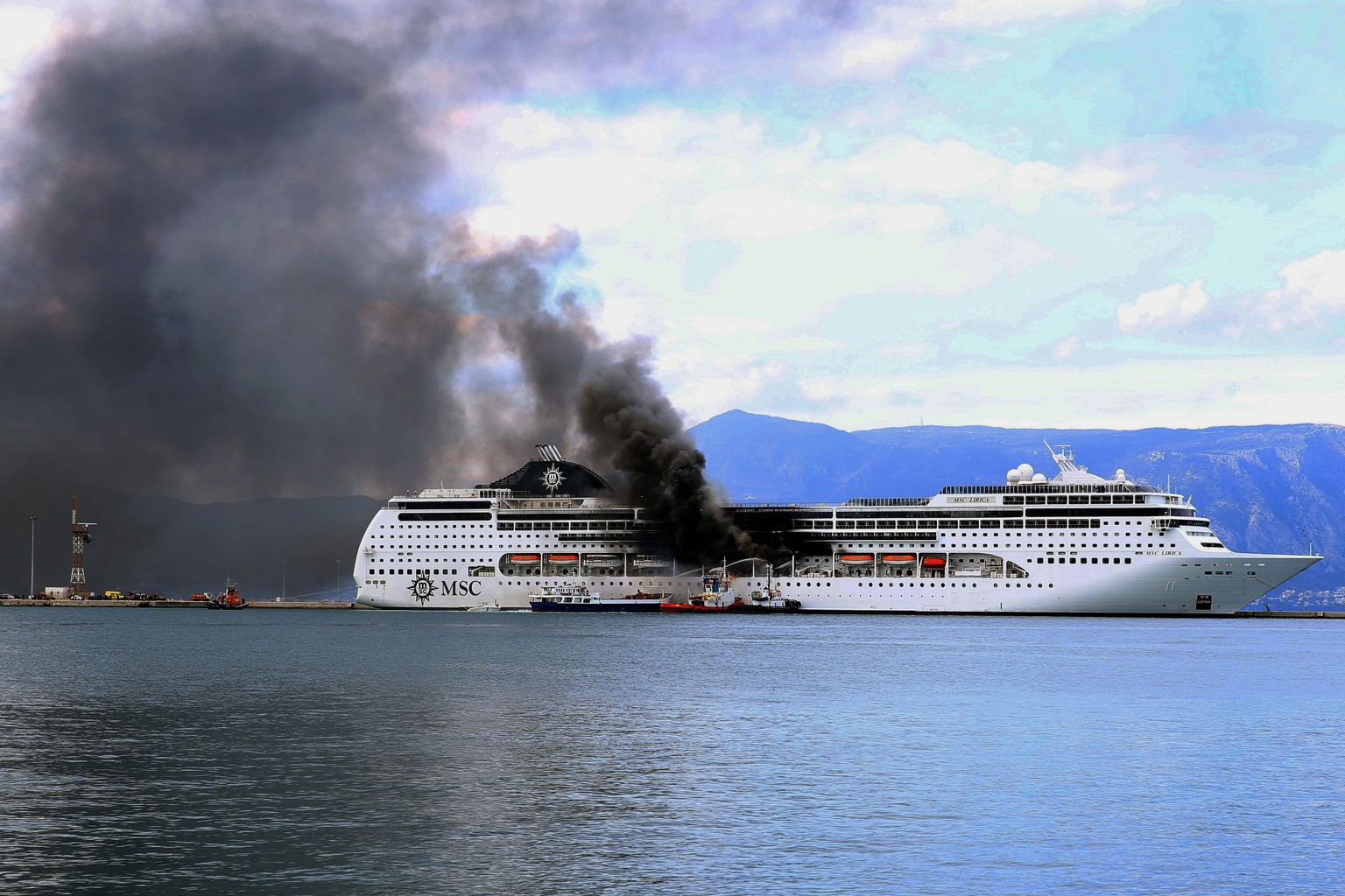 epa09069959 A fire broke out on the &#039;MSC Lirica&#039; cruiseship on 12 March 2021, while it was tied at the Corfu port, Ionian Sea, Greece, since January 30 for the winter season. Onboard were cr ...