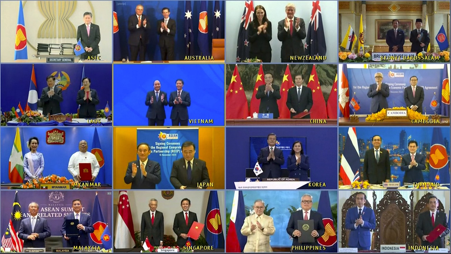 This image made from a teleconference provided by the Vietnam News Agency (VNA) shows the leaders and trade ministers of 15 Regional Comprehensive Economic Partnership (RCEP) countries pose for a virt ...