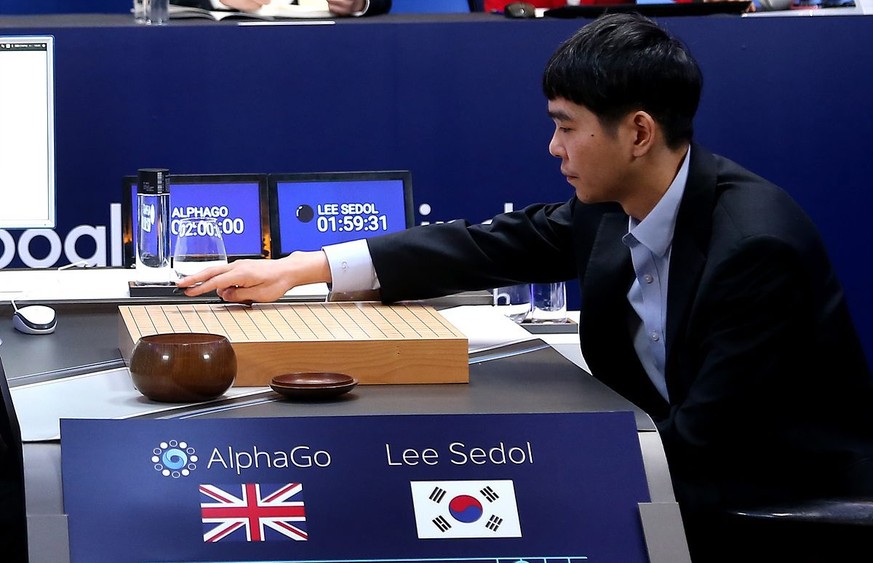 epa05207203 South Korean Go player Lee Se-dol places his first stone to begin his third match with Google&#039;s artificial intelligence program AlphaGo in Seoul, South Korea, on 12 March 2016. Lee lo ...