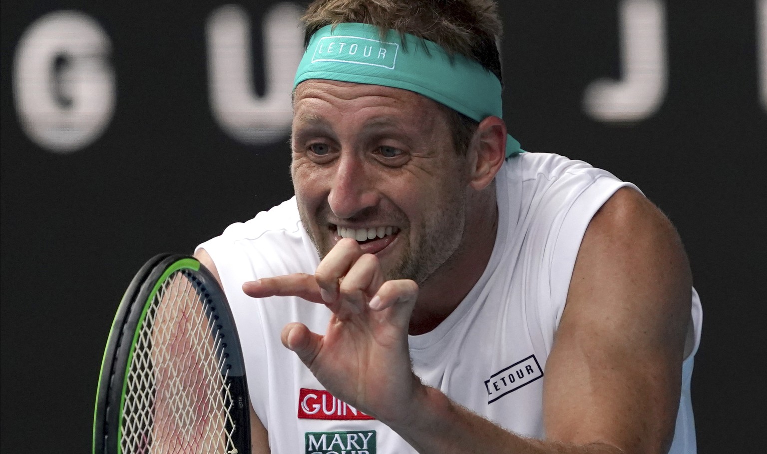 Tennys Sandgren of the U.S. reacts after losing a point to Switzerland&#039;s Roger Federer during their quarterfinal match at the Australian Open tennis championship in Melbourne, Australia, Tuesday, ...