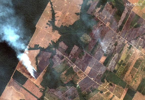 This Aug. 15, 2019 satellite image from Maxar Technologies shows a fire and cleared land southwest of Porto Velho Brazil. Brazil&#039;s National Institute for Space Research, a federal agency monitori ...