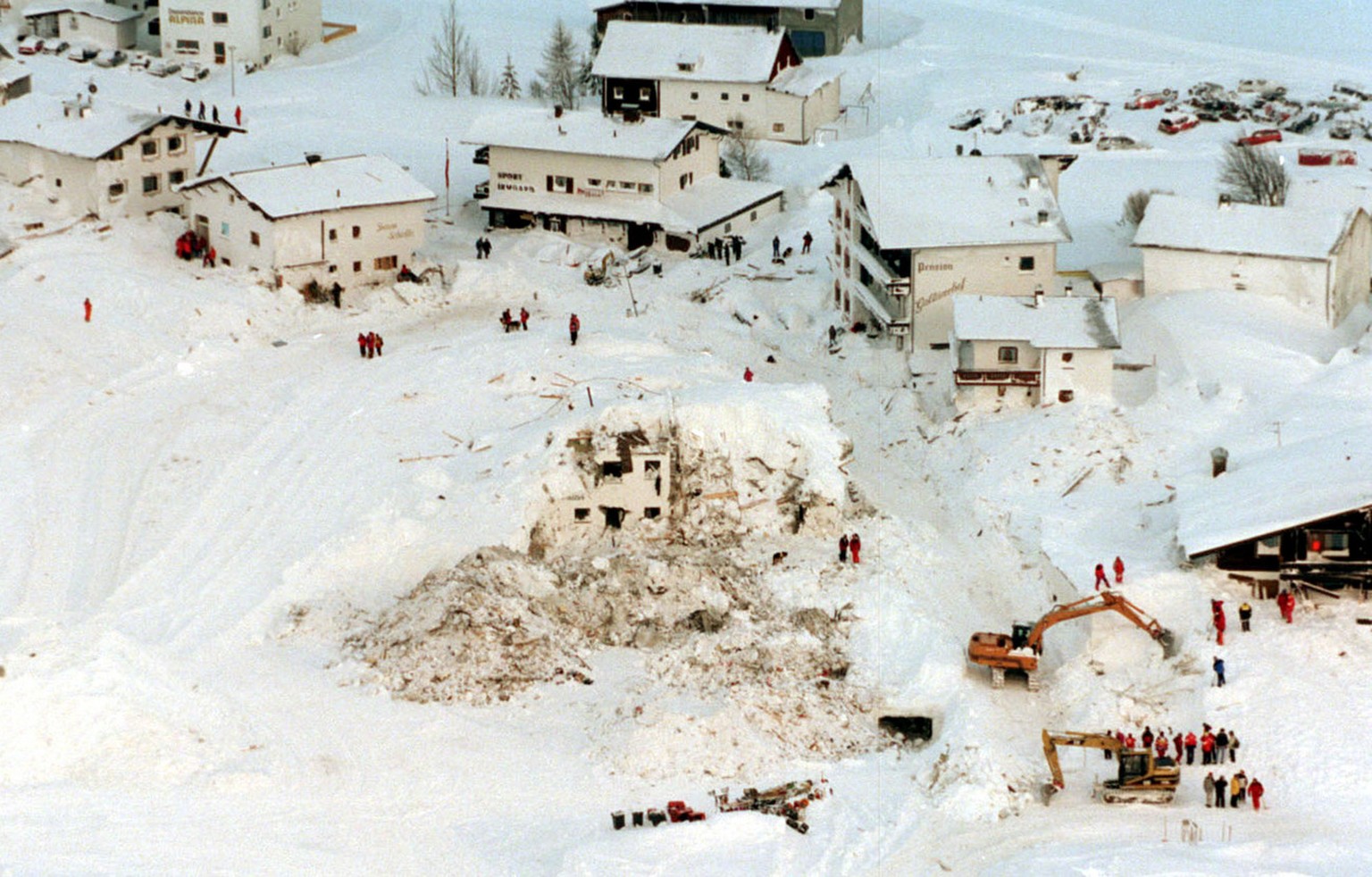 **FILE** Feb. 25 1999 file picture provided by the Austrian defense ministry shows an overal view of the rescue works, which are going on in Galtuer, Austria, after a fatal avalanche hit the skiing re ...