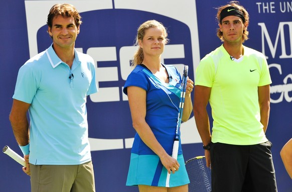 Tennis players, from left, Roger Federer, Kim Clijsters and Rafael Nadal participate in Arthur Ashe Kids Day at the USTA Billie Jean King National Tennis Center on Saturday, Aug. 28, 2010 in New York. ...