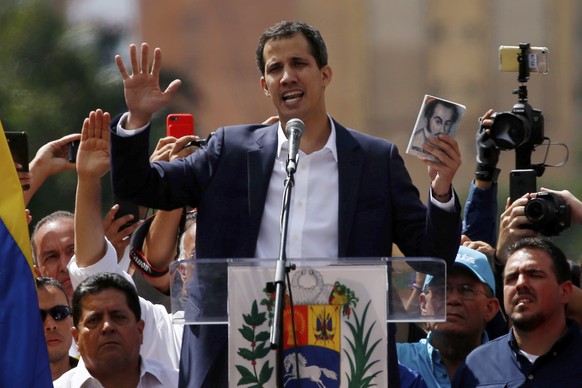 Juan Guaido, head of Venezuela&#039;s opposition-run congress, declares himself interim president of Venezuela, during a rally demanding President Nicolas Maduro&#039;s resignation in Caracas, Venezue ...