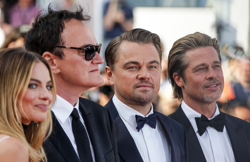 epa07589862 (L-R) Australian actress Margot Robbie, US director Quentin Tarantino, US actor Leonardo DiCaprio and US actor Brad Pitt arrive for the screening of &#039;Once Upon A Time... In Hollywood& ...