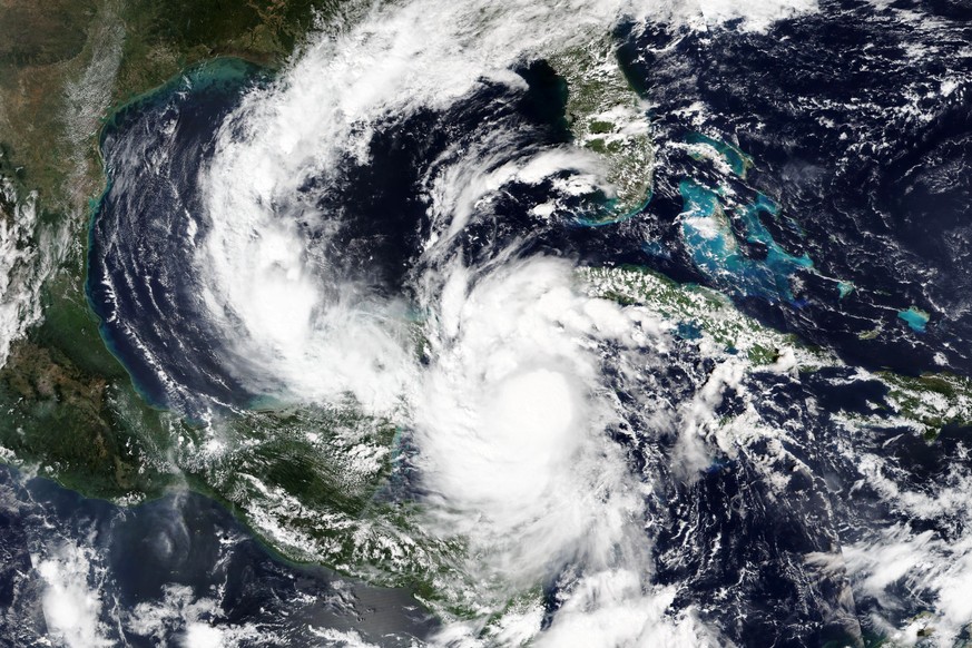 This Tuesday, Oct. 6, 2020, satellite image released by NASA Worldview, Earth Observing System Data and Information System (EOSDIS) shows a strengthening Hurricane Delta. Delta rapidly intensified int ...