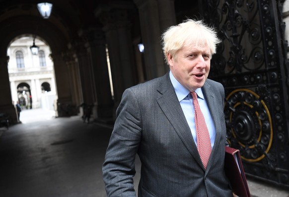 epa08707797 Britain&#039;s Prime Minister Boris Johnson (R) departs following a political cabinet meeting in Downing Street in London, Britain, 30 September 2020. Prime Minister Johnson is expected to ...